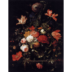 A glass of flowers and an orange A glass of flowers and an orange