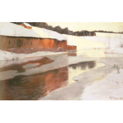 A factory building near an icy river in winter A factory building near an icy river in winter