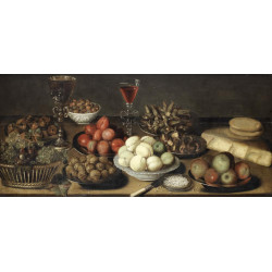 Dishes of fruit and nuts with glasses of wine on a table top Dishes of fruit and nuts with glasses of wine on a table top